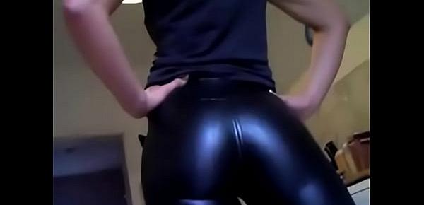  woman in leather pants